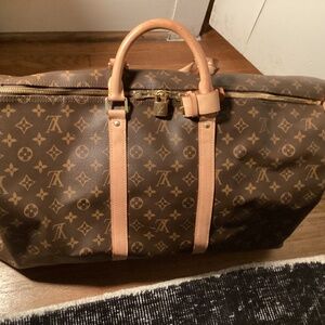 Authentic LV Keep all 55 used for a one day shoot, excellent condition.